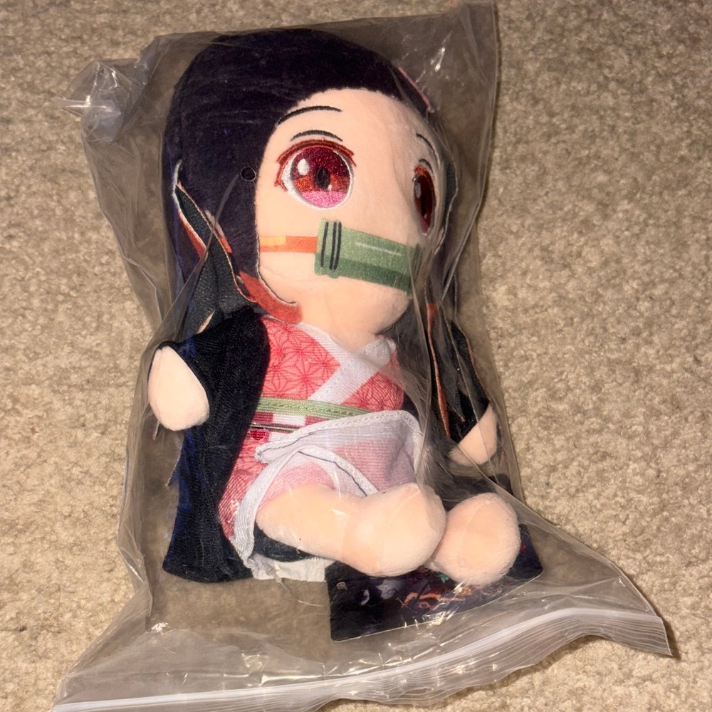 Anime-Inspired Stuffed Doll with Black and Pink Outfit